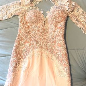 Long sleeve lace gown with train. size 4 .